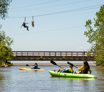 A group of boaters on the water at Lake Erie Canopy Tours